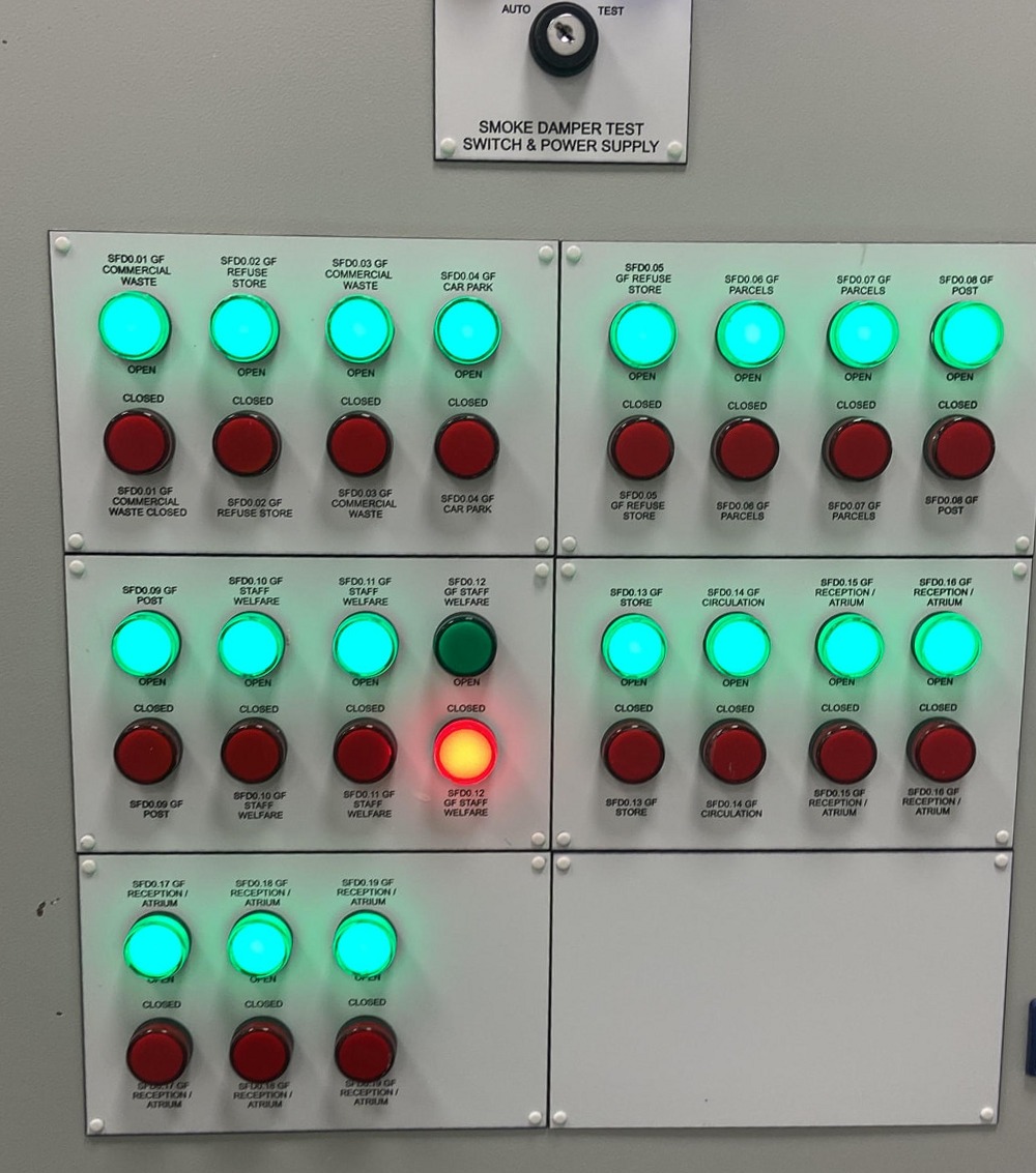 Smoke damper mimic panel showing open and closed status indicators